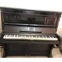 tipos de piano-piano vertical-decoración-mecanismo-sala-pared